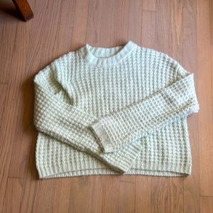 mint green sweater that’s slightly cropped and not worn VERY soft and comfy